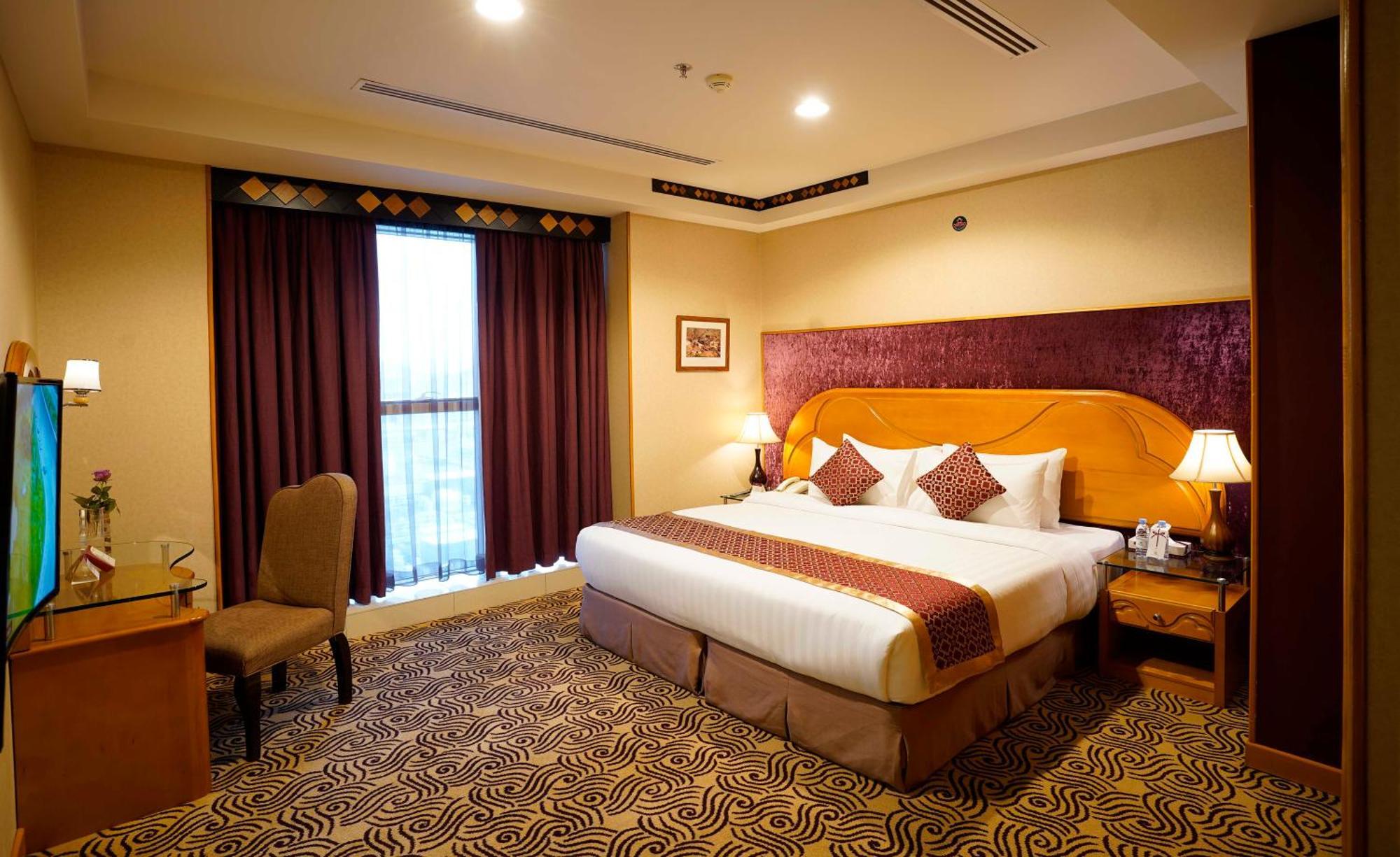 Awaliv International Hotel Ta'if Oda fotoğraf A bedroom at the hotel