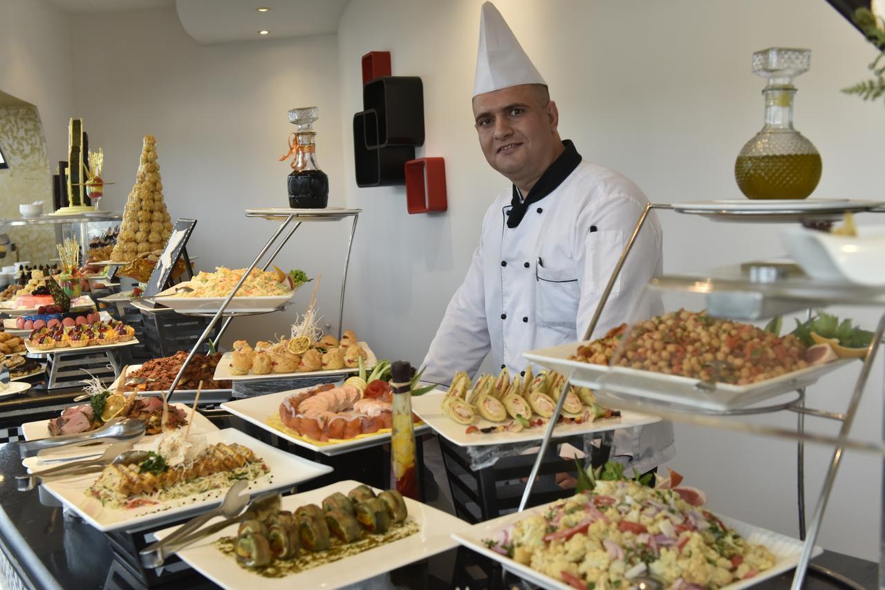 Awaliv International Hotel Ta'if Dış mekan fotoğraf A buffet at a hotel